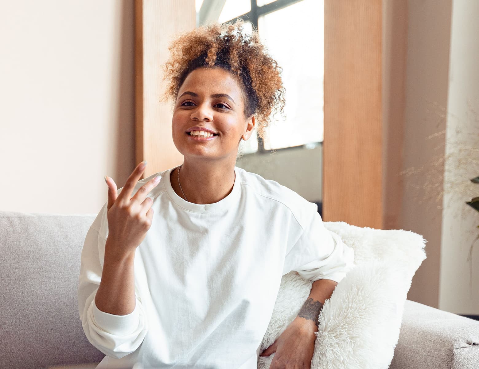 A woman in conversation during a coaching session